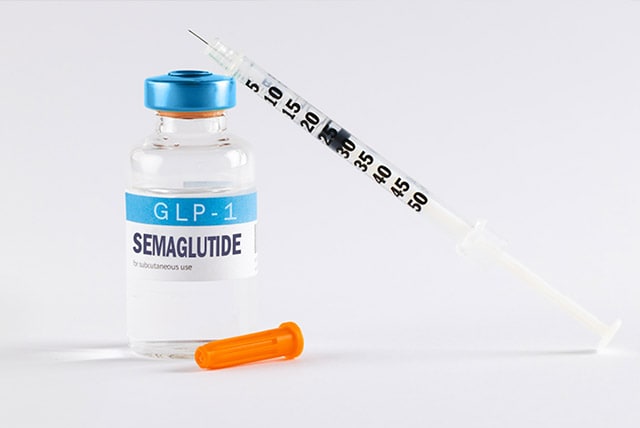 A vial of semaglutide and syringe