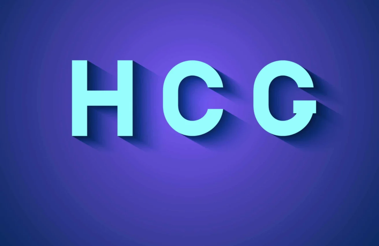 The letters "HCG" in bold, light blue font with long shadows appear on a purple gradient background.