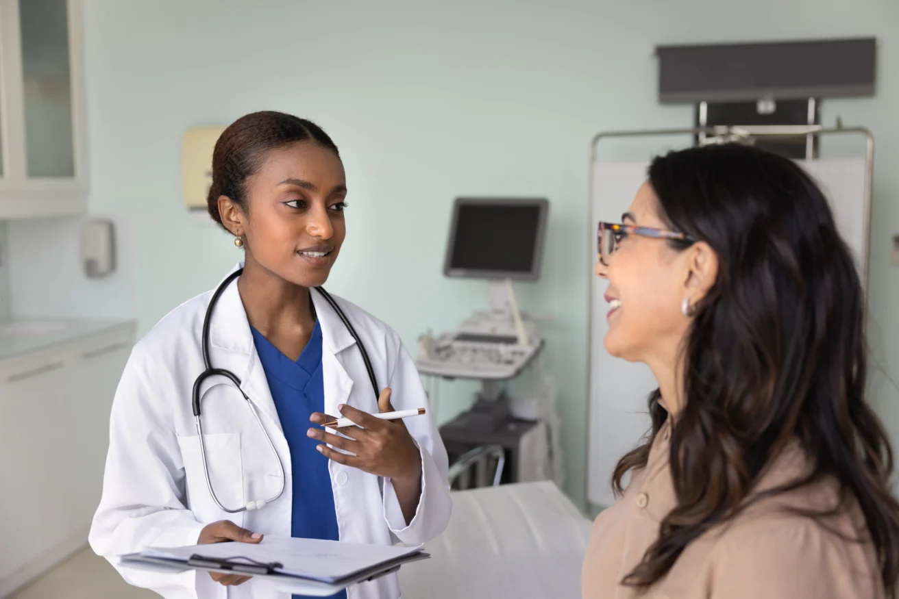 A doctor and a patient talking.