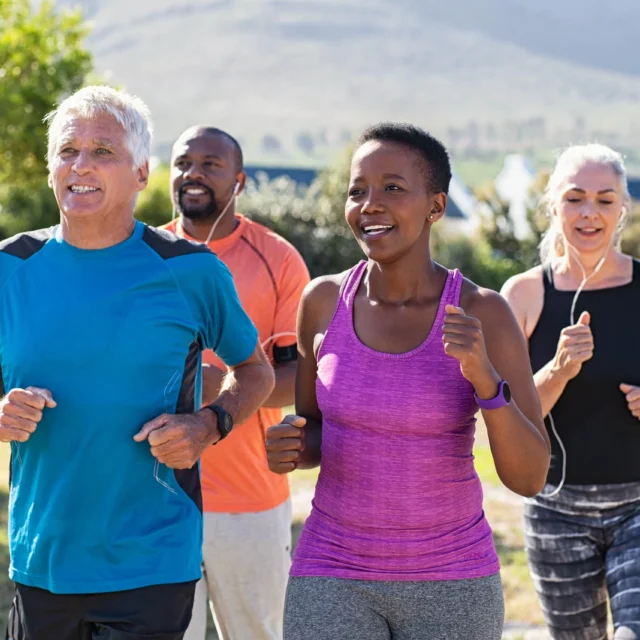 A group of people jogging together.