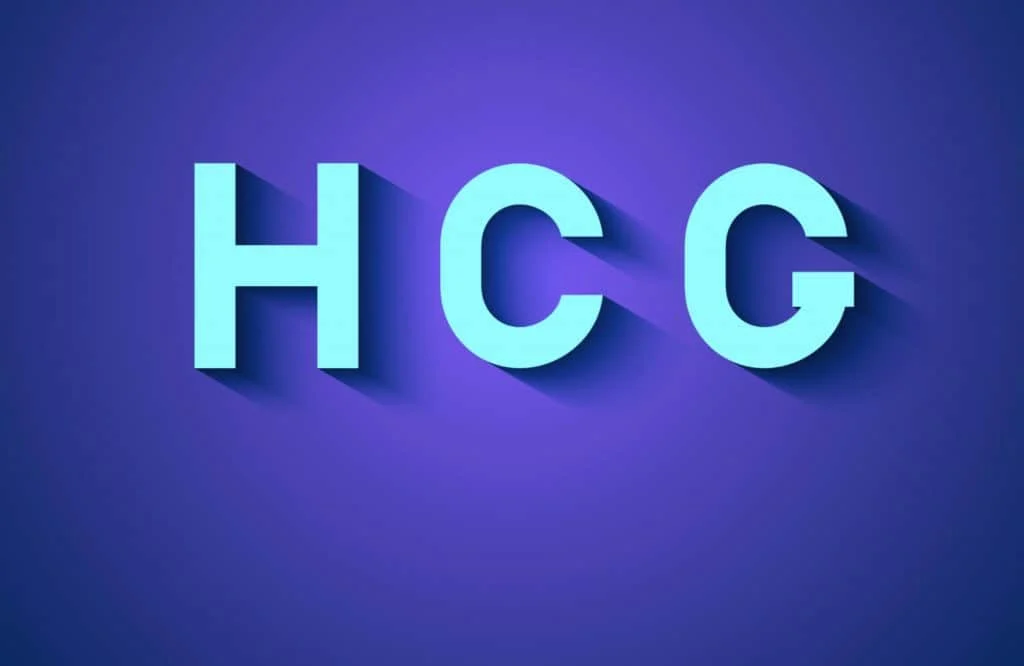 Bold blue letters "HCG" with a shadow effect on a purple background.