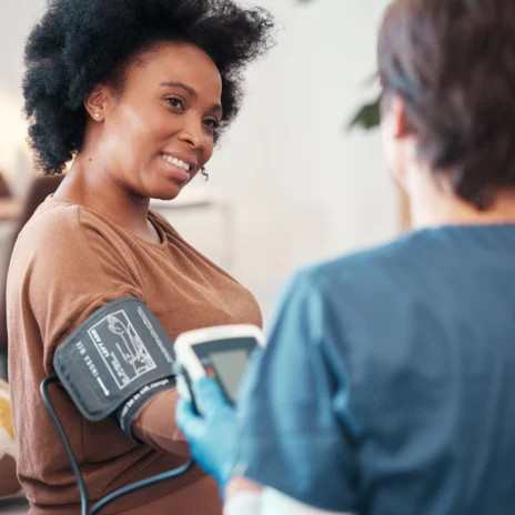 A patient getting their blood pressure checked.