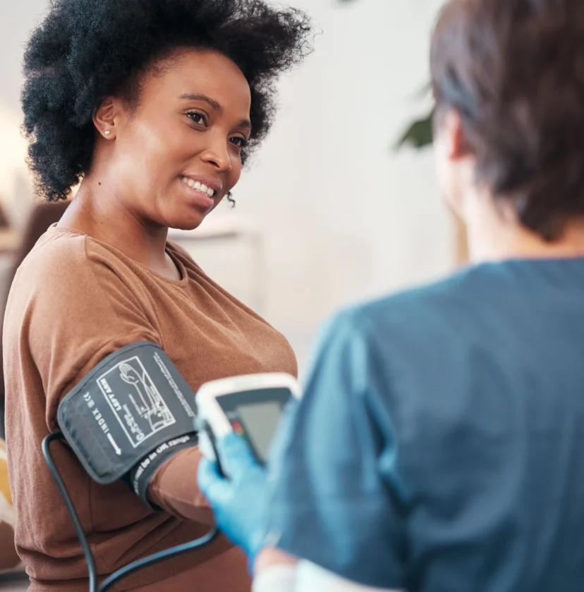 A patient getting their blood pressure checked.