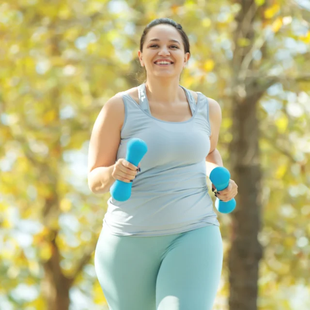A woman jogging outside.
