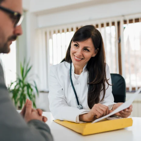 A physician consulting a patient.