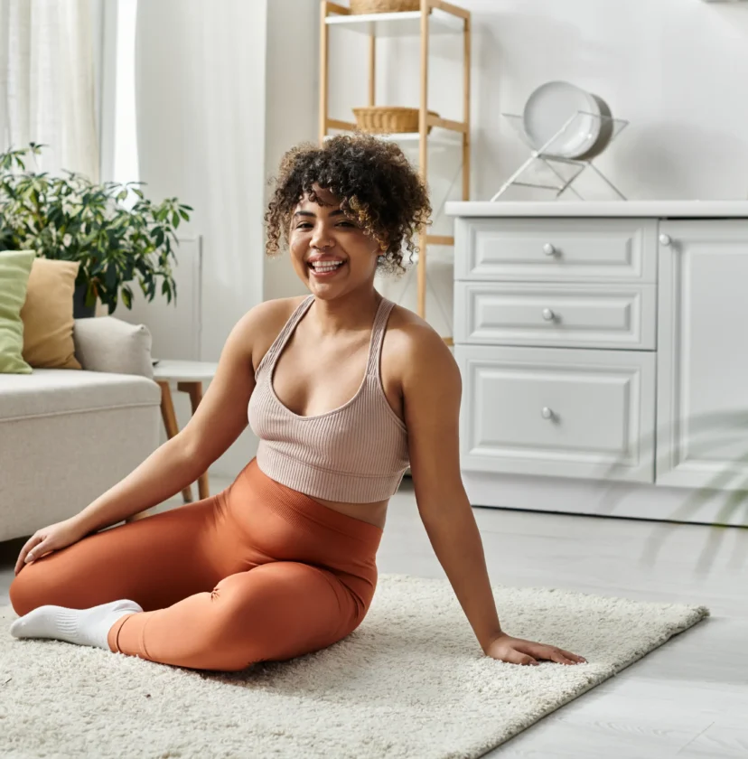 Woman doing yoga in family room
