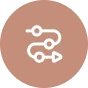 White icon of a connected, branching path with circles and an arrow on a brown circular background.