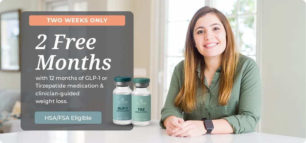 A smiling woman sits at a table next to two medication vials labeled GLP-1 and TRZ. A banner reads: 2 Free Months with 12 months of GLP-1 or Tirzepatide medication & clinician-guided weight loss. HSA/FSA eligible.